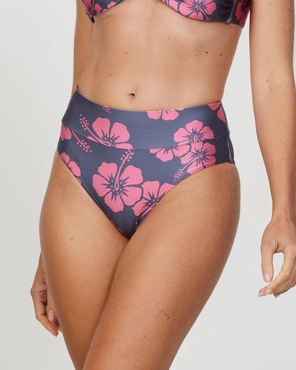 Closeup front view of a female model wearing the Okanui Sundance High Waist Pant Bikini Bottom n Hibiscus Iron Pink