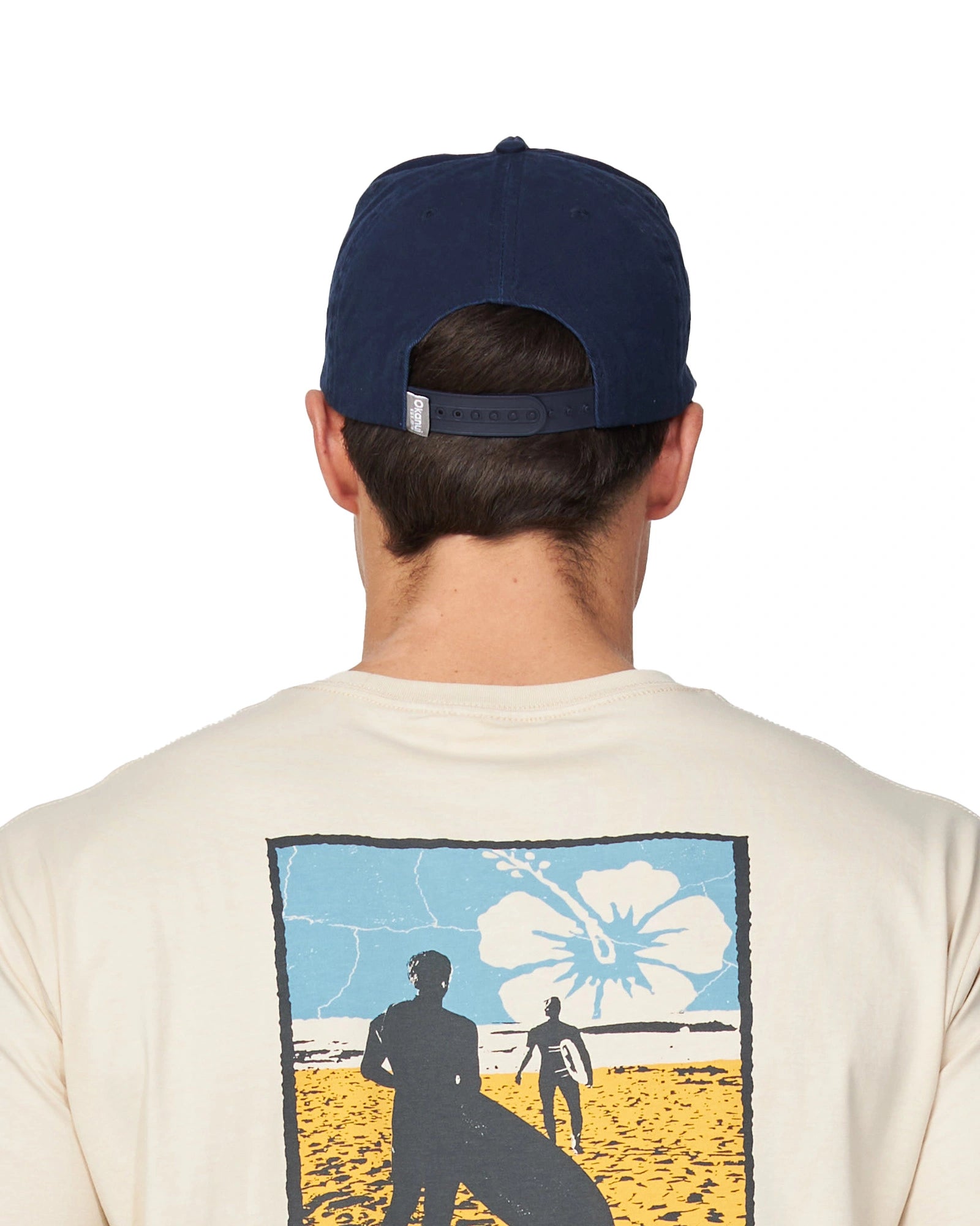 Back view of a male model wearing the Okanui Classic Lock up snapback trucker cap in Navy