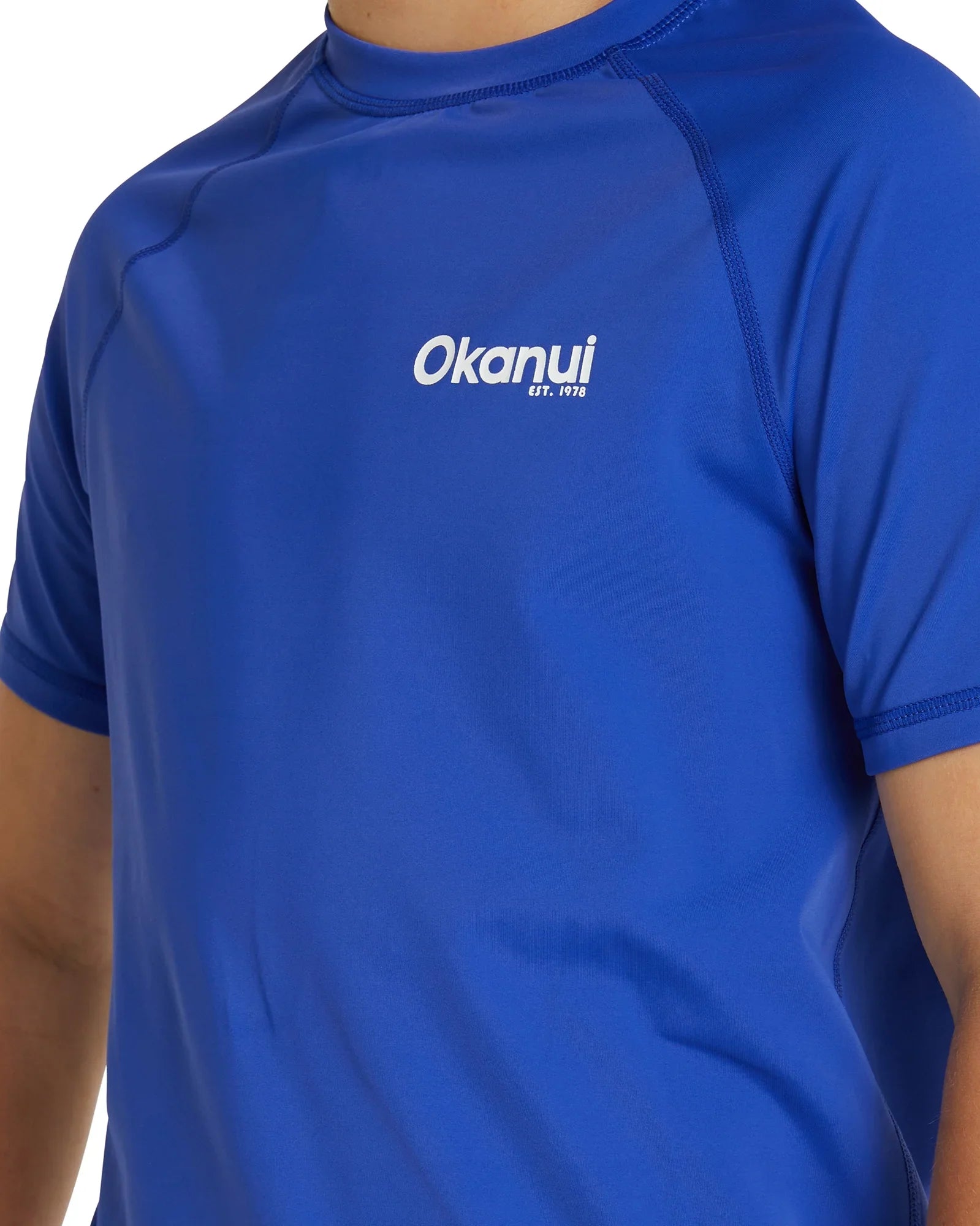 Okanui Kids summer short sleeve rashie in royal blue with white print.