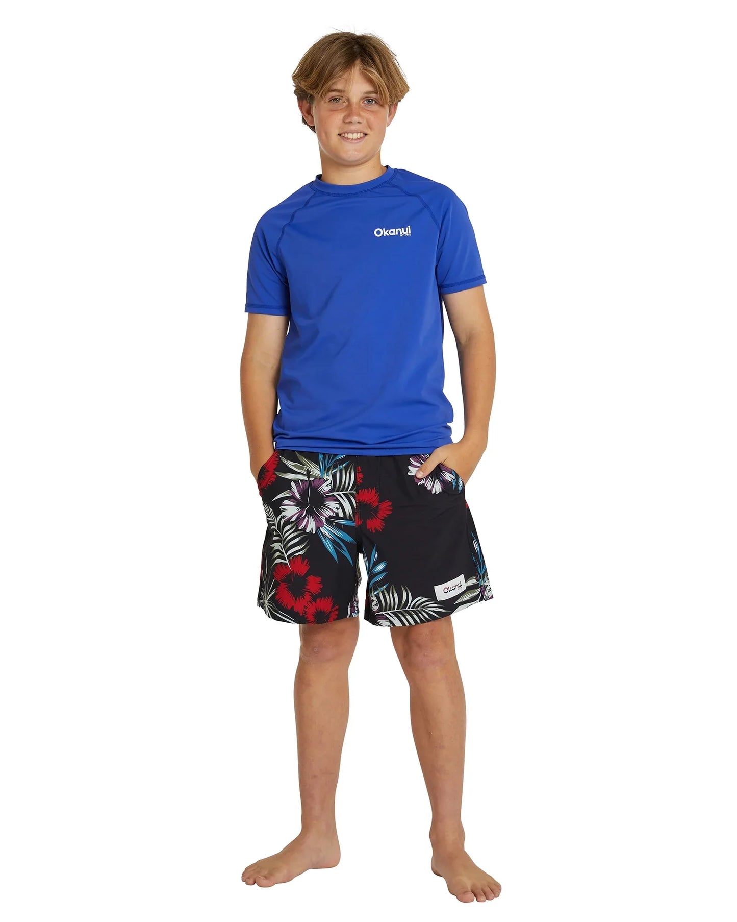 Front view details of Okanui Kids summer short sleeve rashie in royal blue.