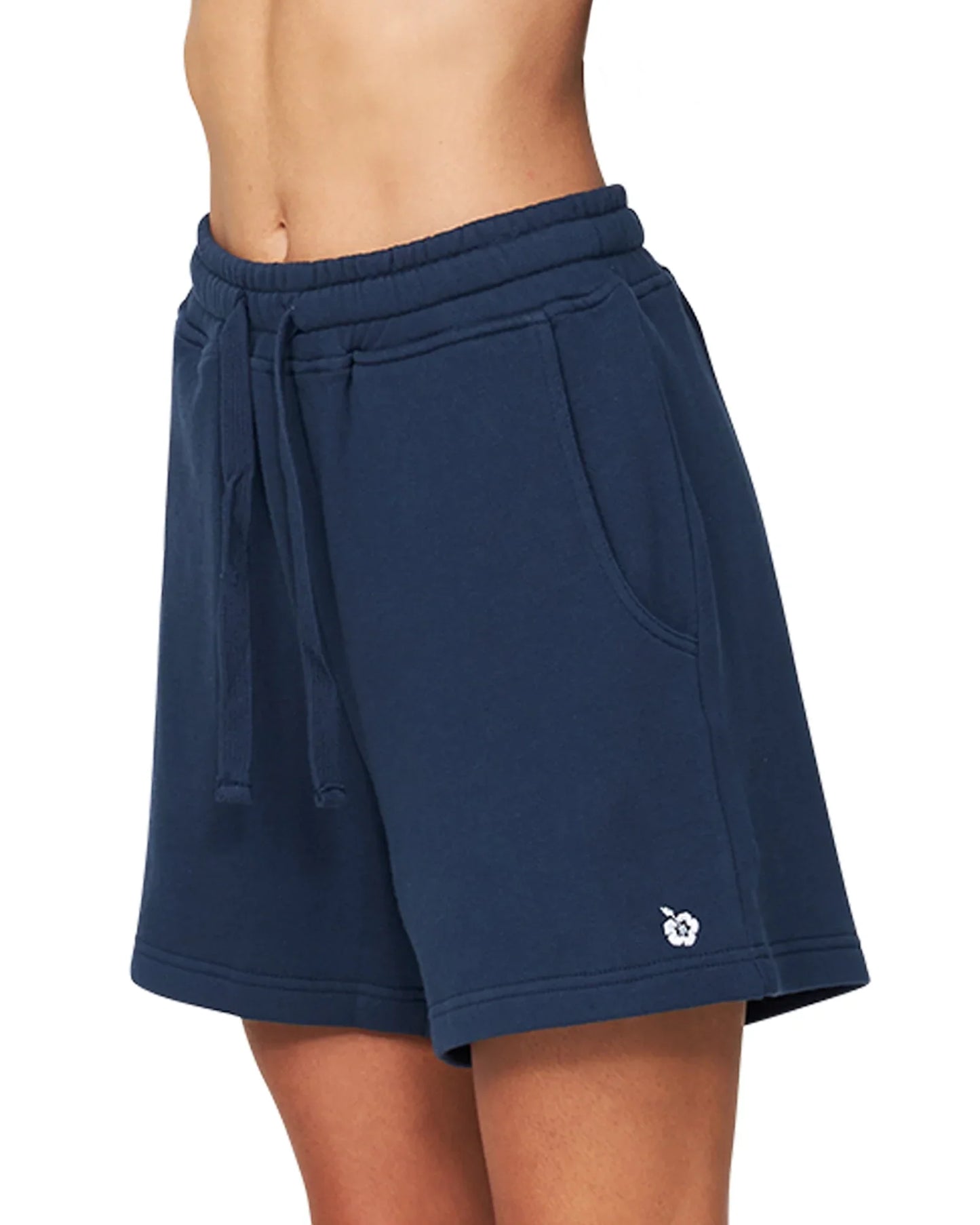 Womens fleece short in navy blue color showing the side part view.
