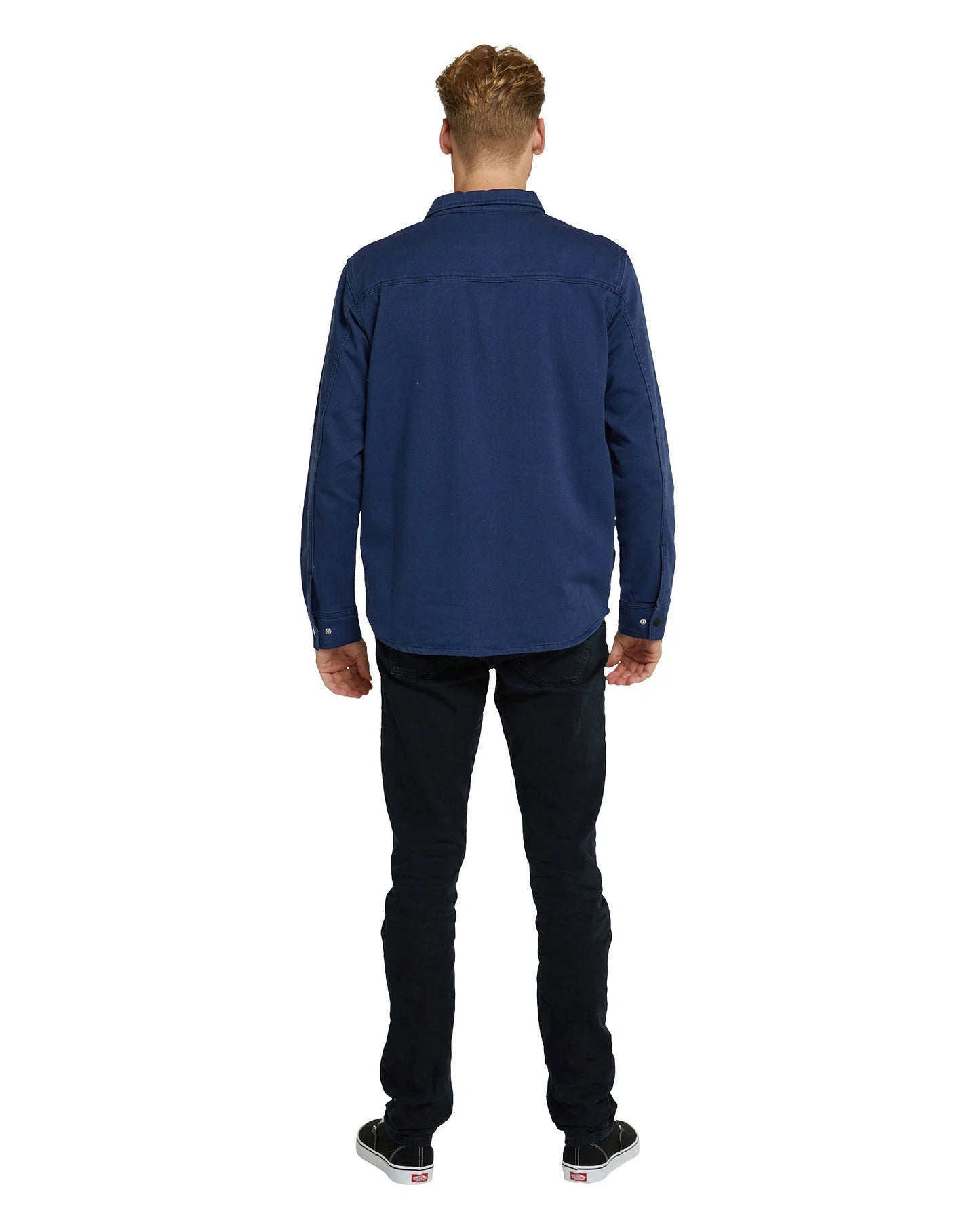 Okanui mens jacket in navy blue color with white top and black pants showing the back view. 