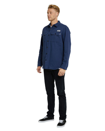 Mens winter jacket in navy blue color showing the side part. 