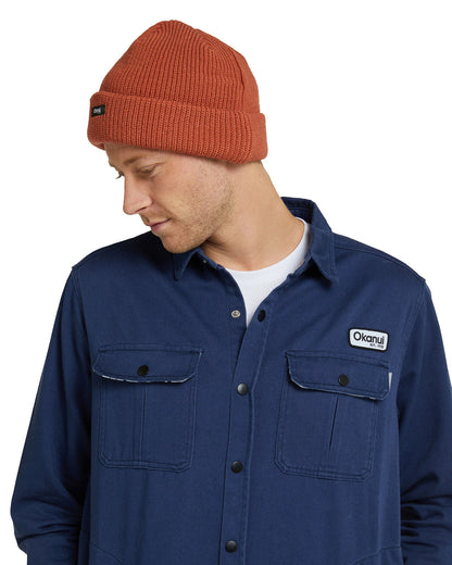 Mens navy blue jacket with rust color bonnet. 