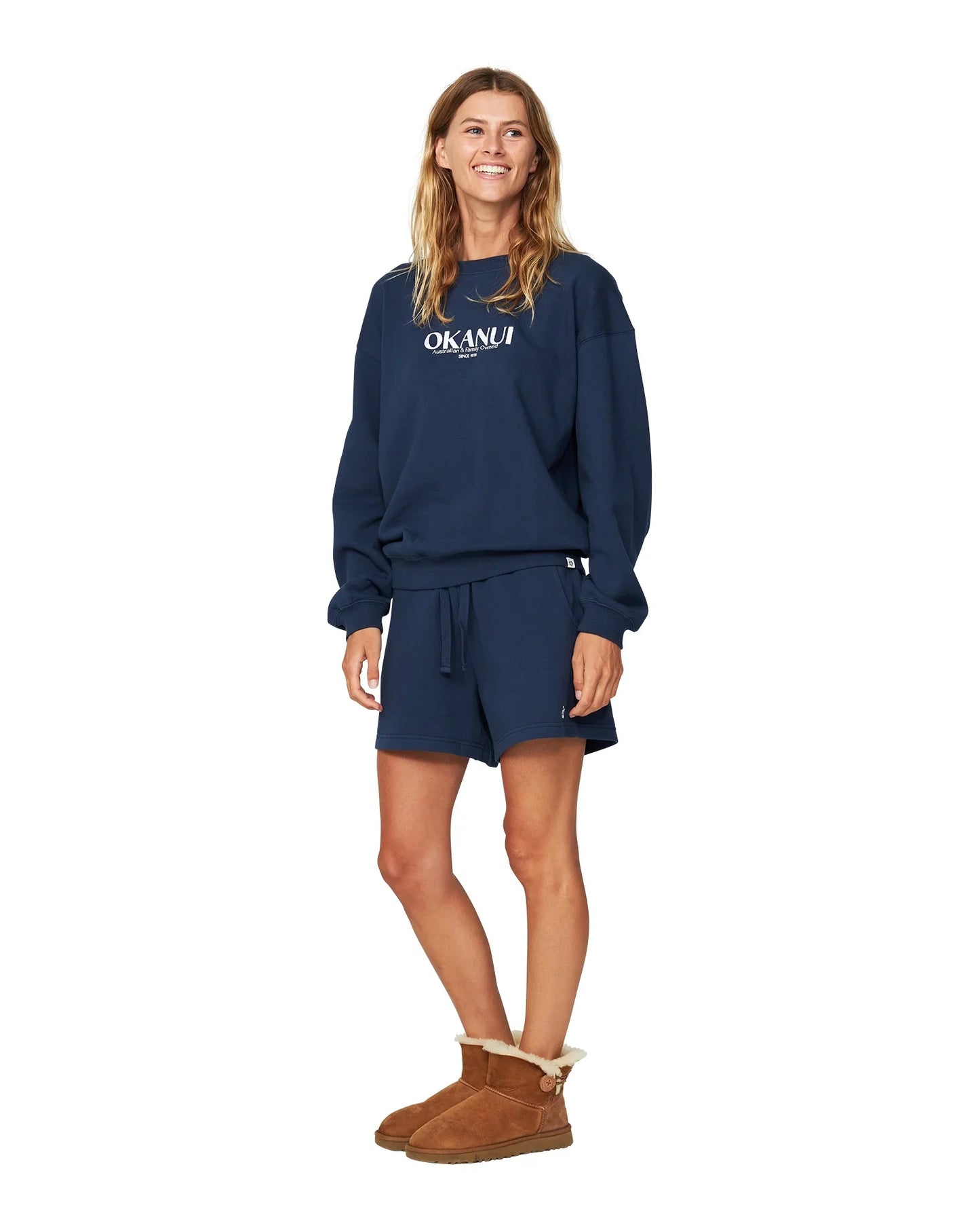 Womens winter fleece with navy blue-colored short showing the side part. 