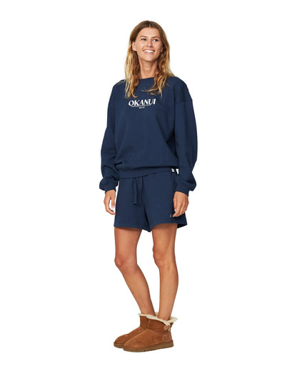 Womens winter fleece with navy blue-colored short showing the side part. 