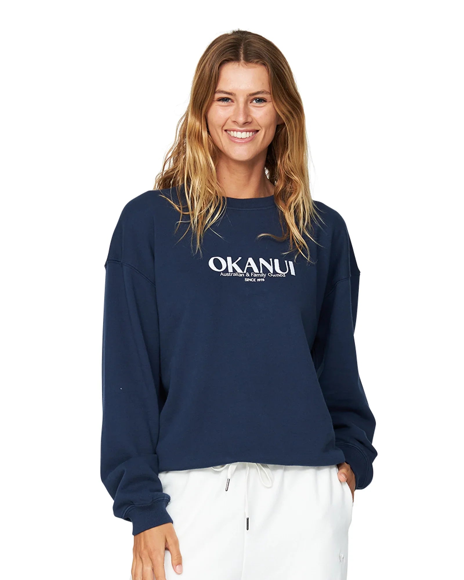 Womens winter fleece with white Okanui logo in the middle part.