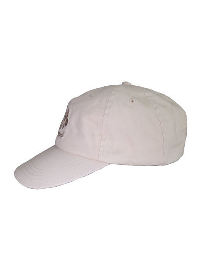 Left Side view of the Okanui Womens Snapback Trucker Cap in Natural