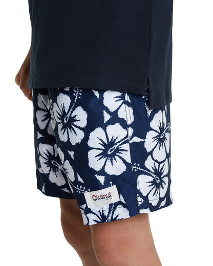 Close up photo of the Okanui classic polo shirt in Navy, crafted from 100% premium cotton in a stepped hemline cut