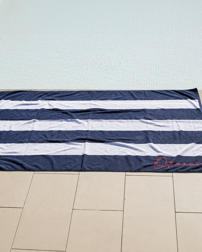 Upside part of the Okanui stripe navy towel