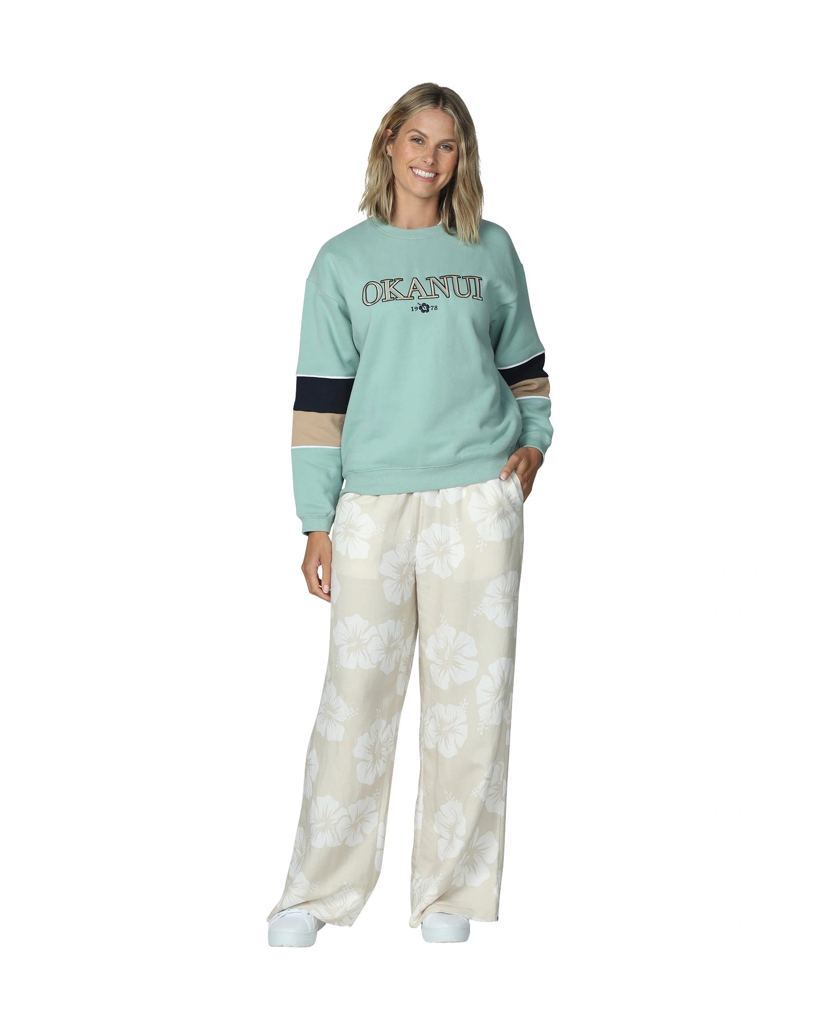  Women's sage colored winter sweater with hibiscus flower pants.