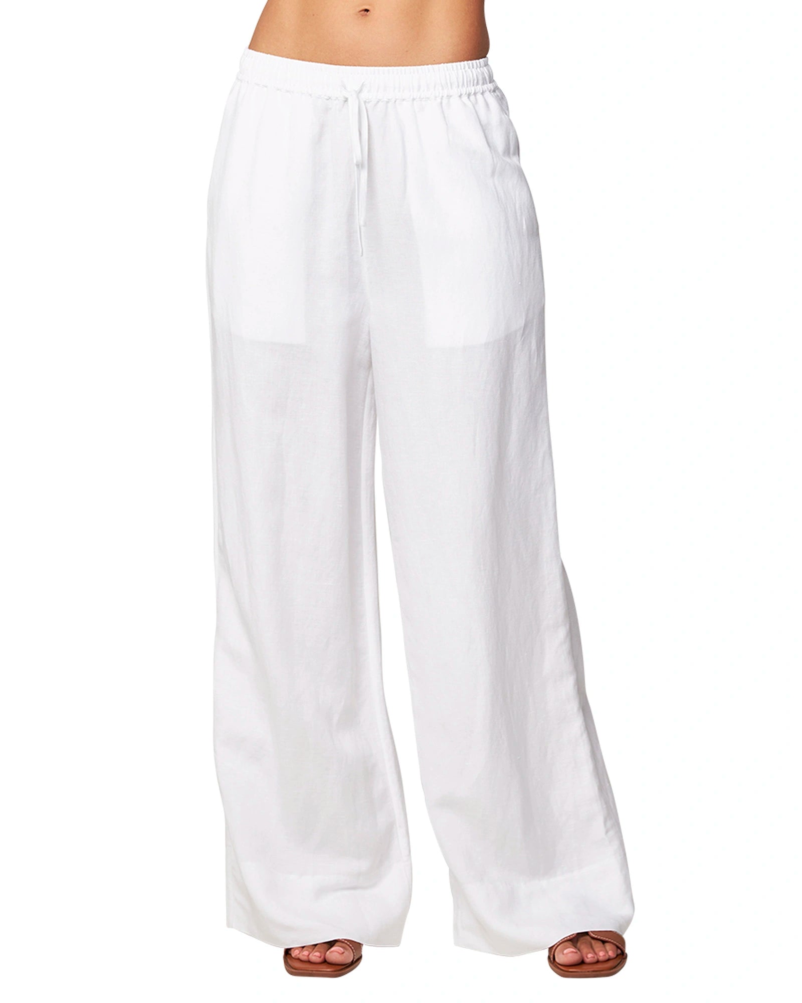 Front view of the Okanui wide leg linen beach pants in white color