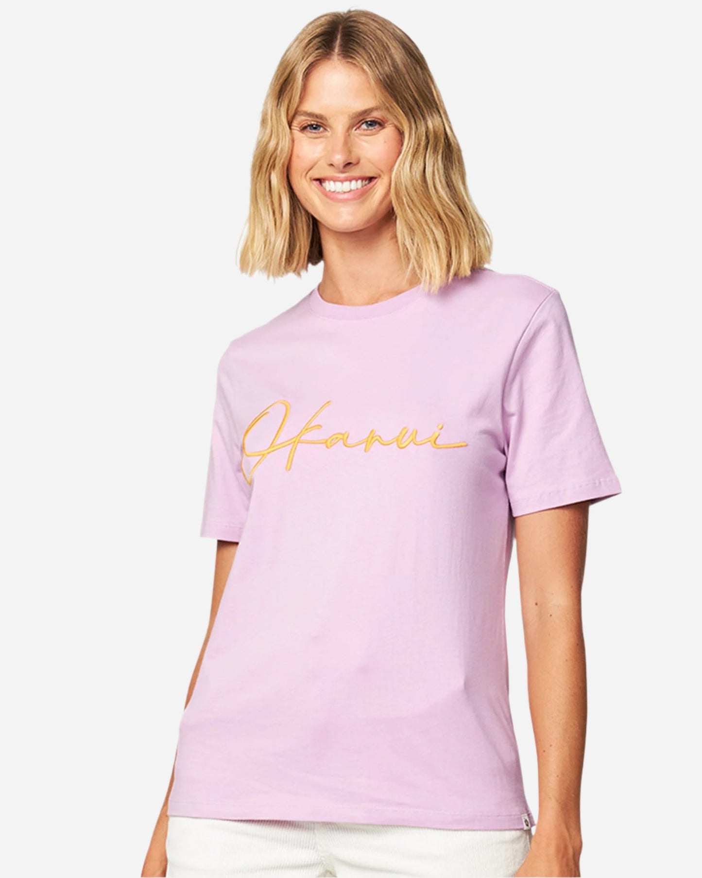 Front view of a female model wearing the Okanui Signature cotton T-shirt in Washed Lilac