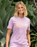 Front view of a female model wearing the Okanui Signature cotton T-shirt in Washed Lilac