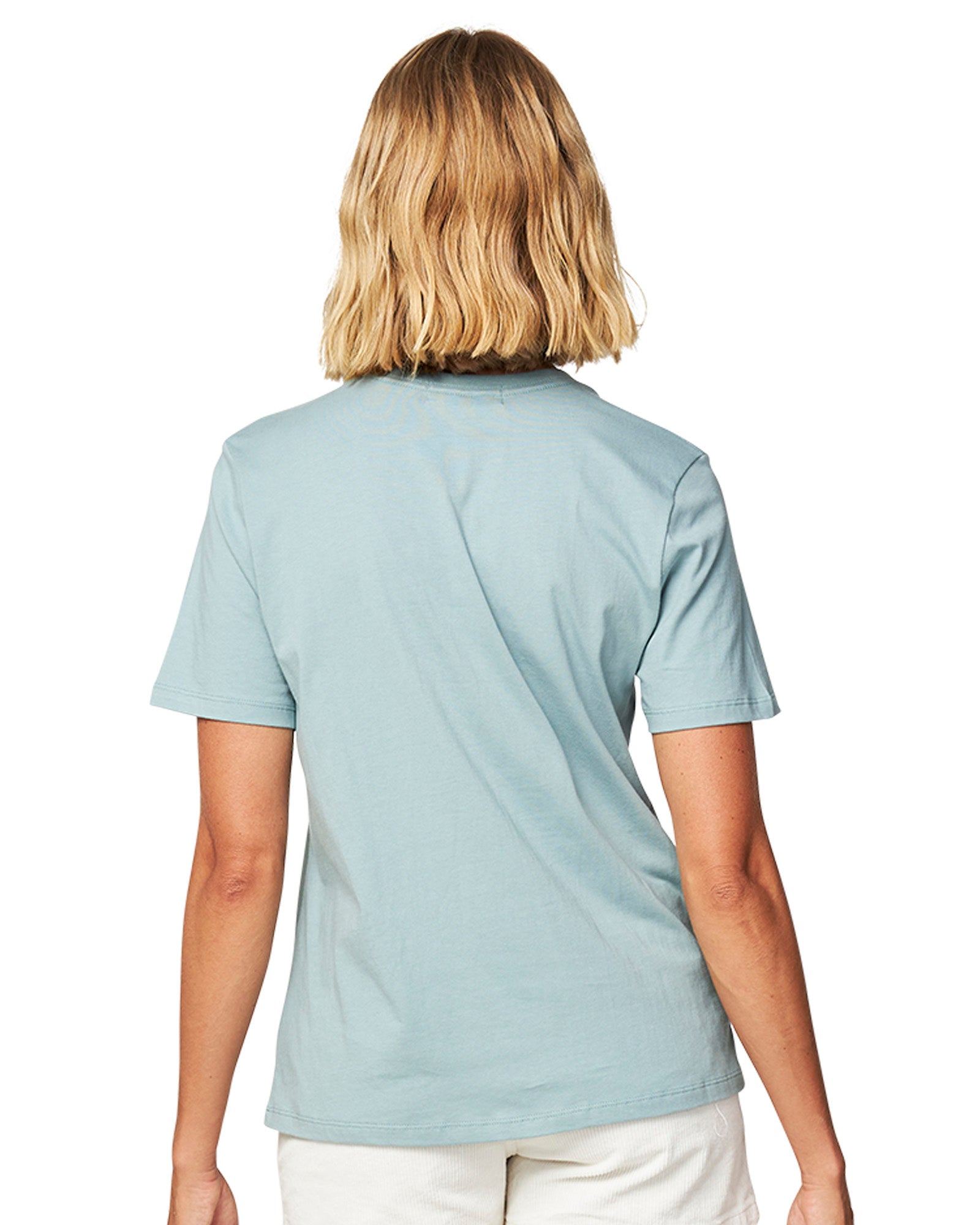 Close up back view of a female model wearing the Okanui Signature short sleeves T-shirt in Sage color