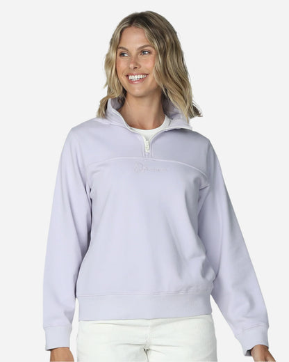 Womens half zip sweater in color lilac showing the Okanui logo in the middle part. 