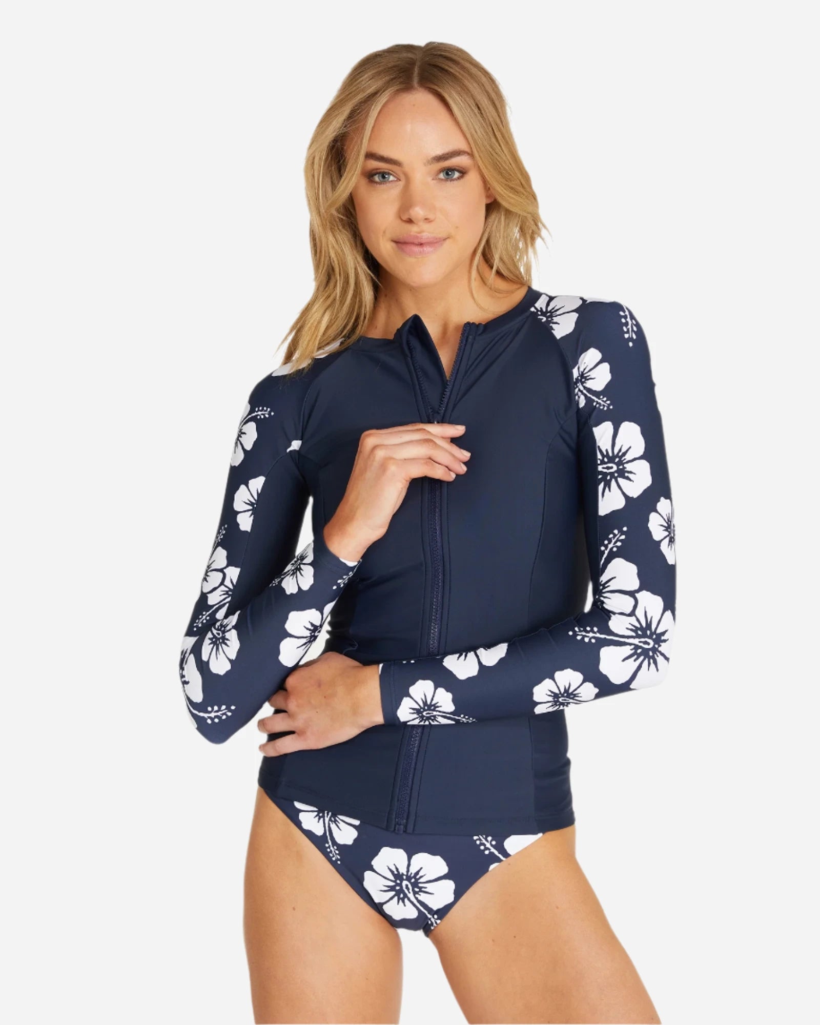 The Okanui Women's long sleeve rashie in hibiscus panel navy.