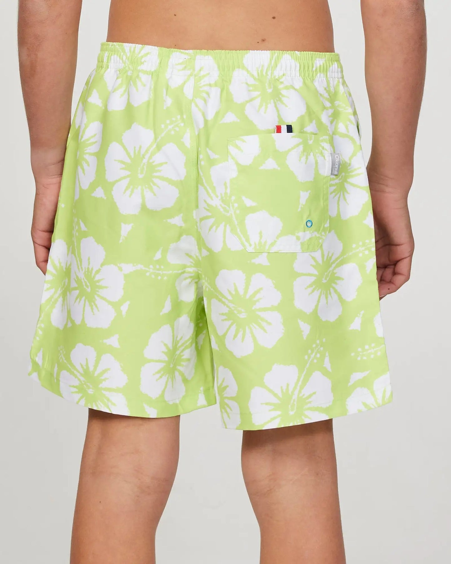 Back view of the Okanui Swim Short for boys in Hibiscus Washed Lime