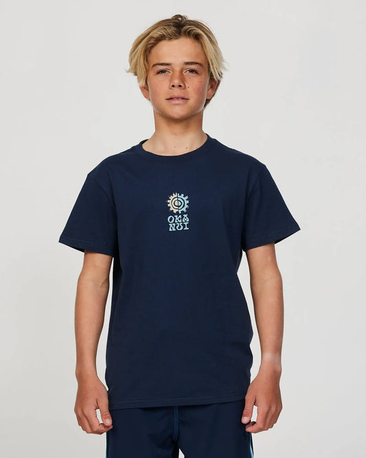 Closeup front view of a boy model wearing the Okanui Twin Flame T-shirt for boys in Navy