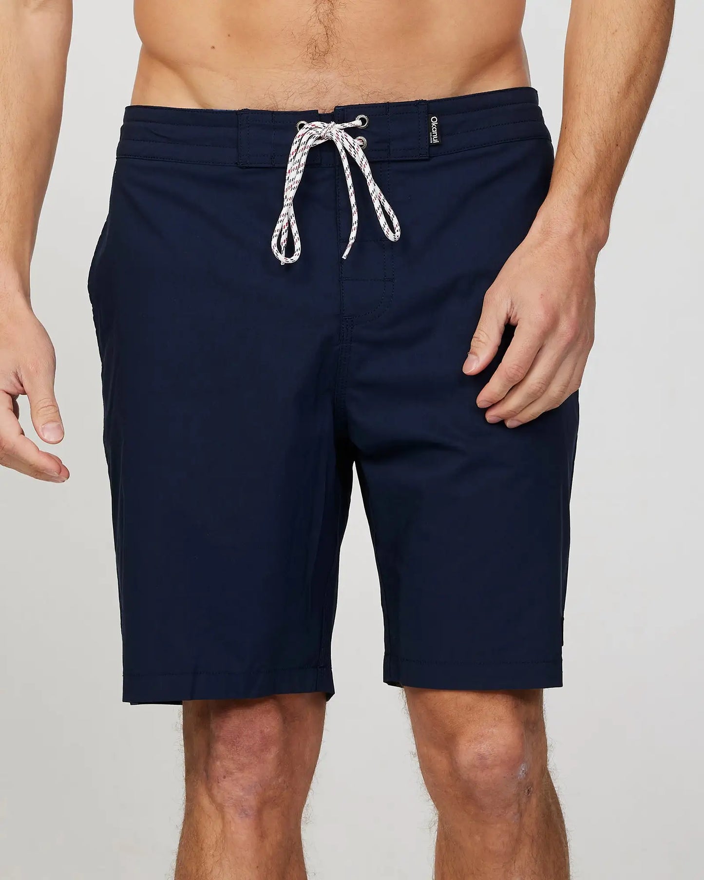 Front view of the Okanui Mens Rinsed boardrider board short n Navy