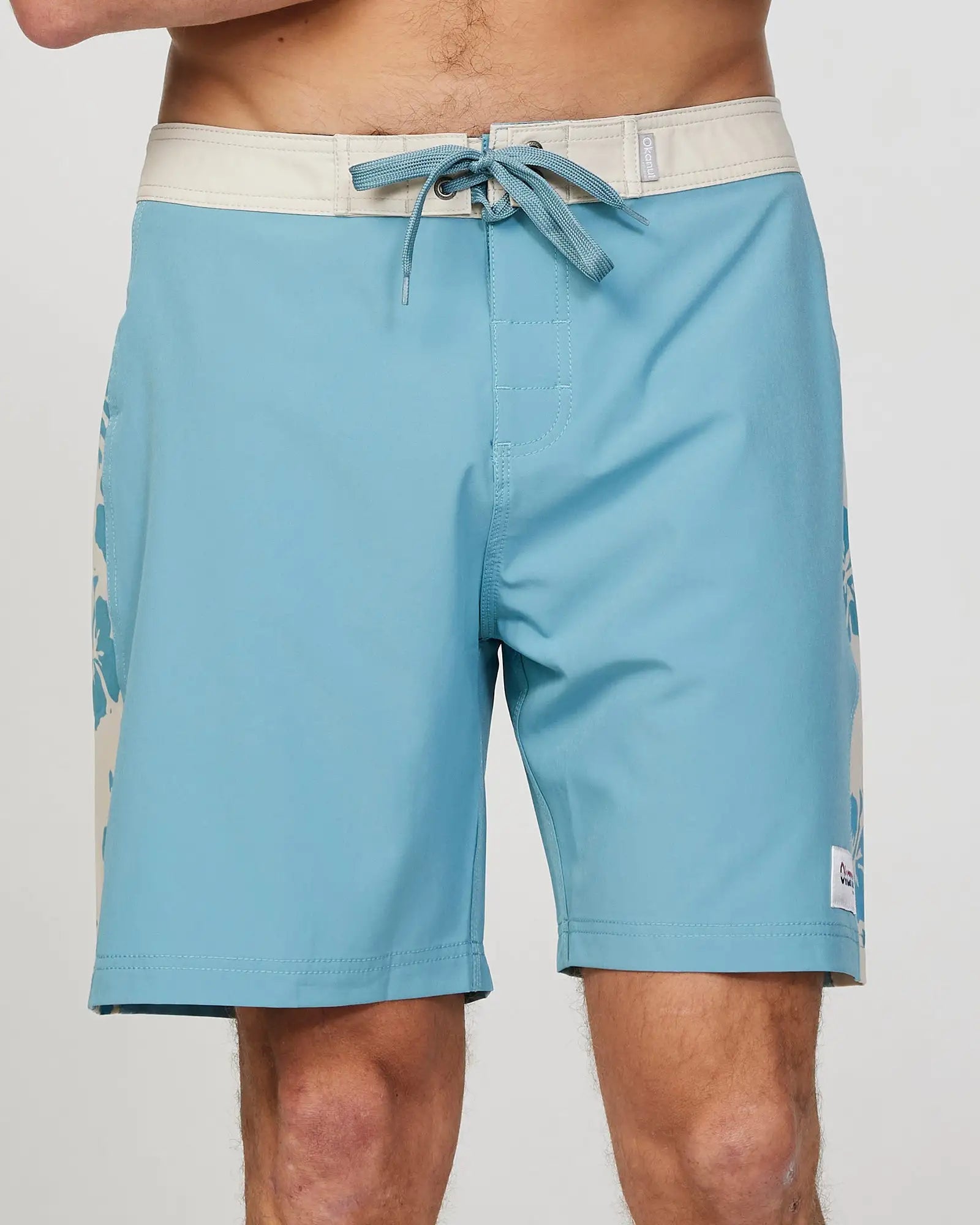 Front view of the Okanui Mens Waterworld boardrider board short in Aqua