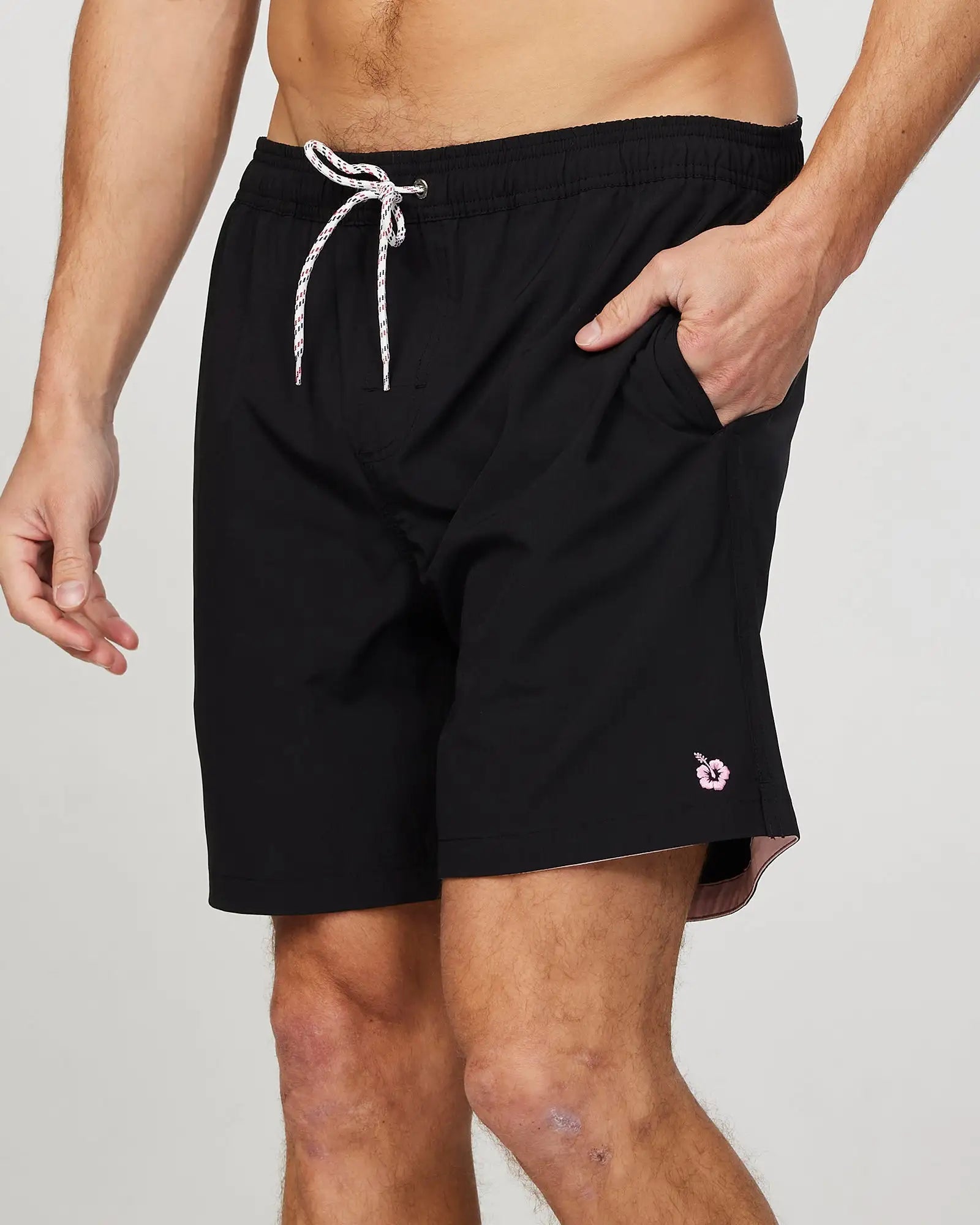 Angled front view of the Okanui Mens Onboard stretch swim short in Black