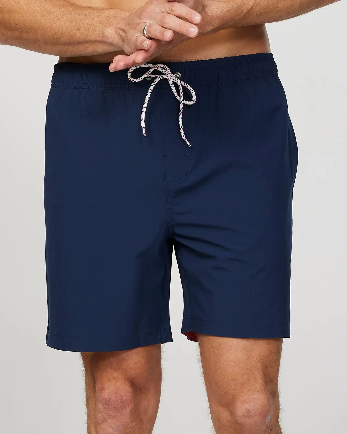 Front view of the Okanui Mens Onboard stretch swim short in Navy