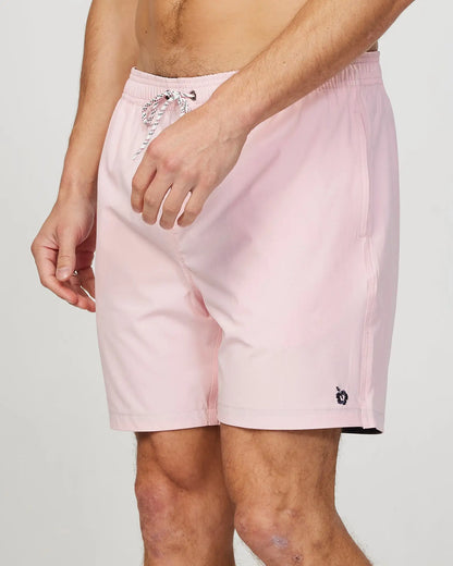 Left side view of the Okanui Mens Onboard stretch swim short in Pink