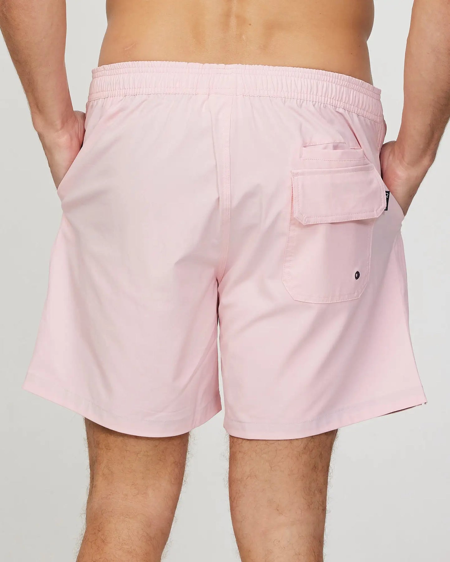 Back view of the Okanui Mens Onboard stretch swim short in Pink