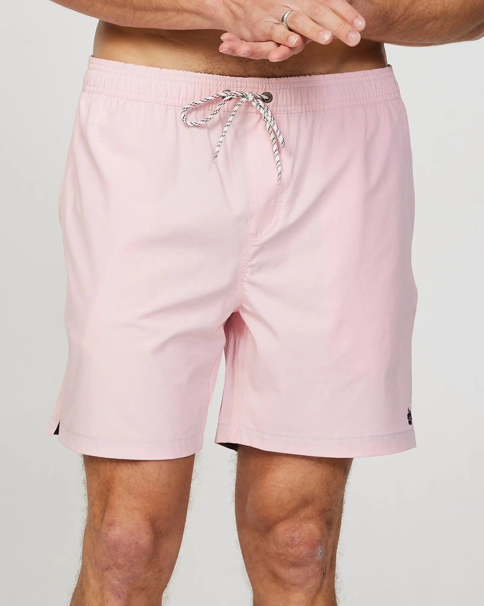 Front view of the Okanui Mens Onboard stretch swim short in Pink