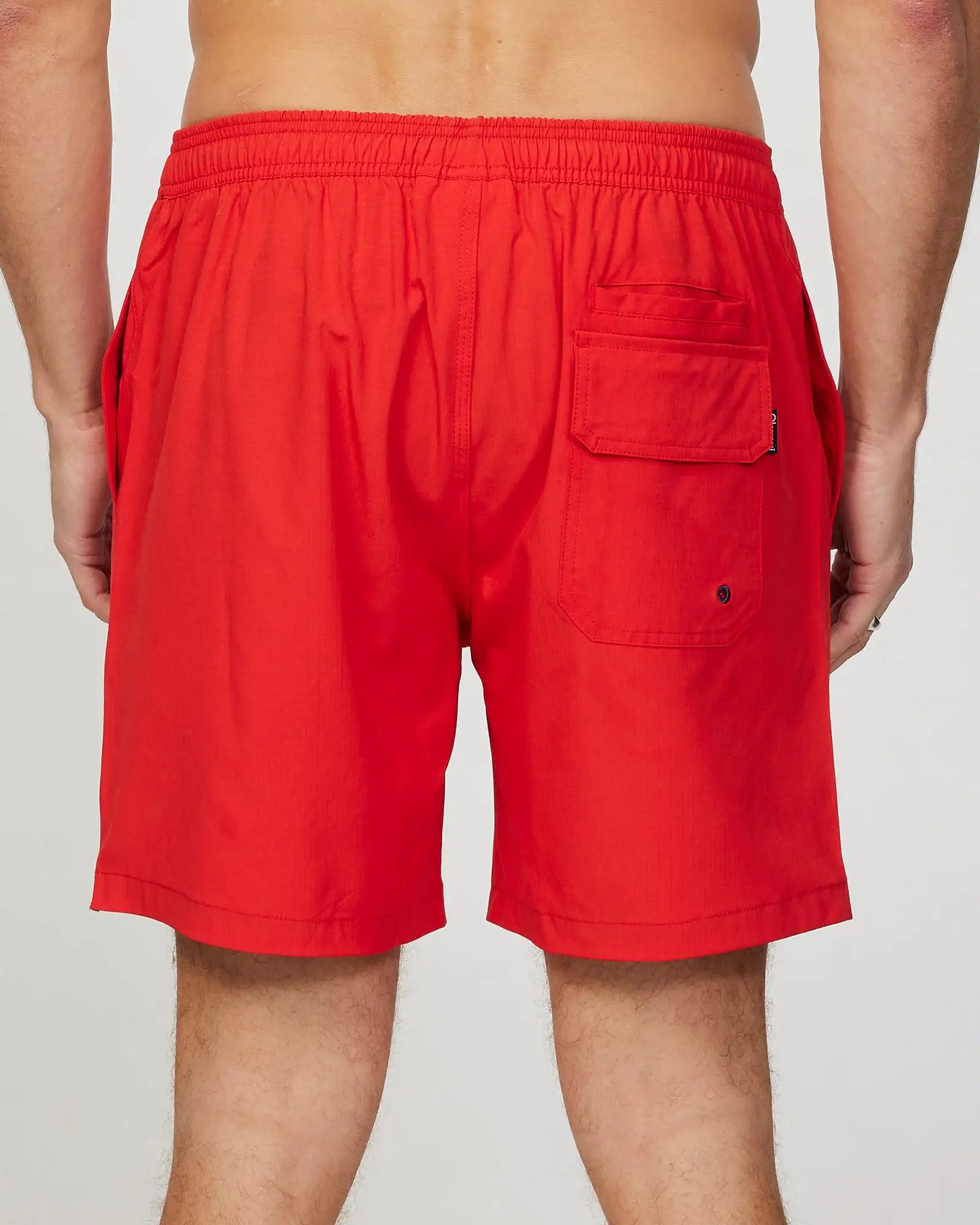 Back view of the Okanui Mens Onboard stretch swim short in Red