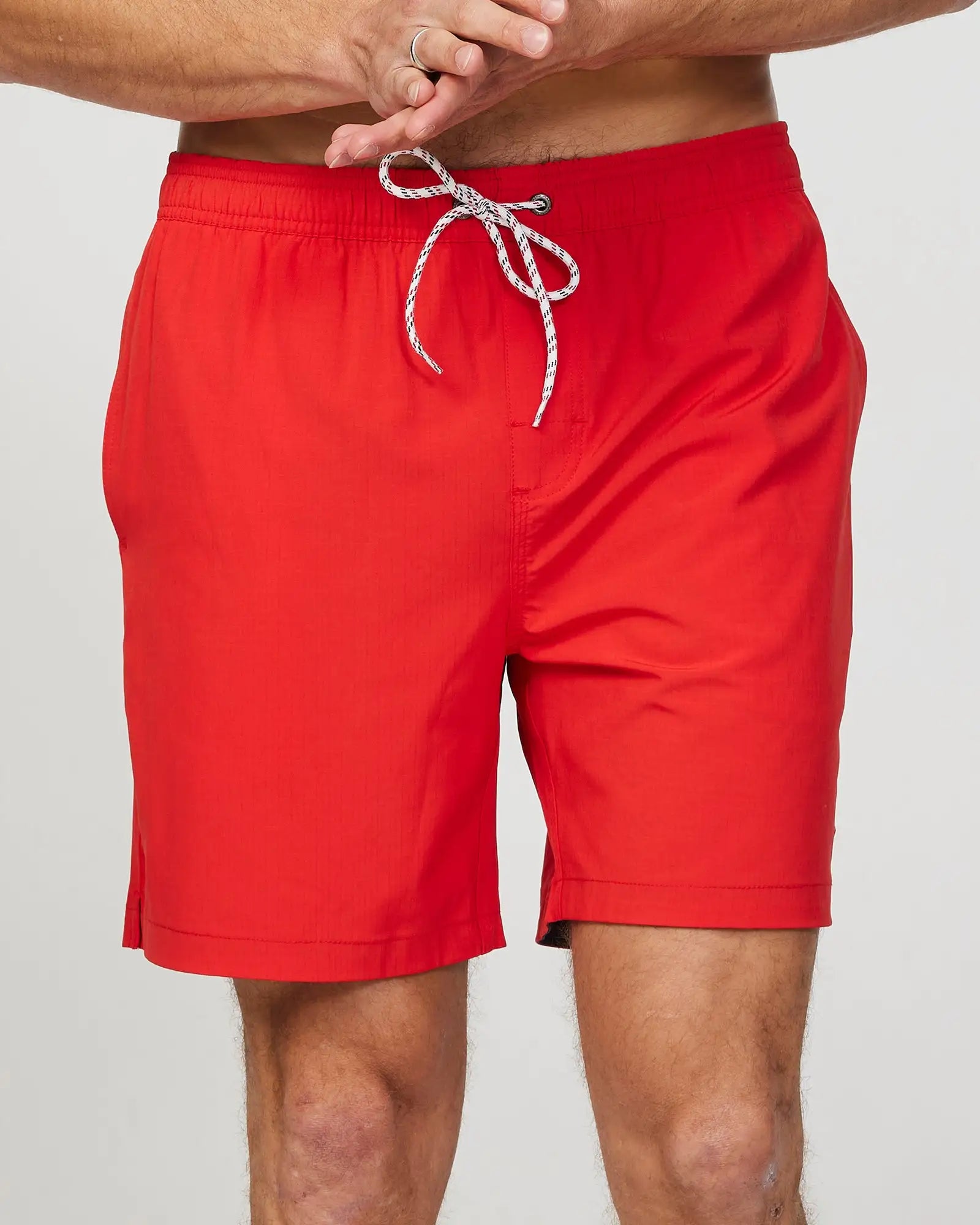 Front view of the Okanui Mens Onboard stretch swim short in Red