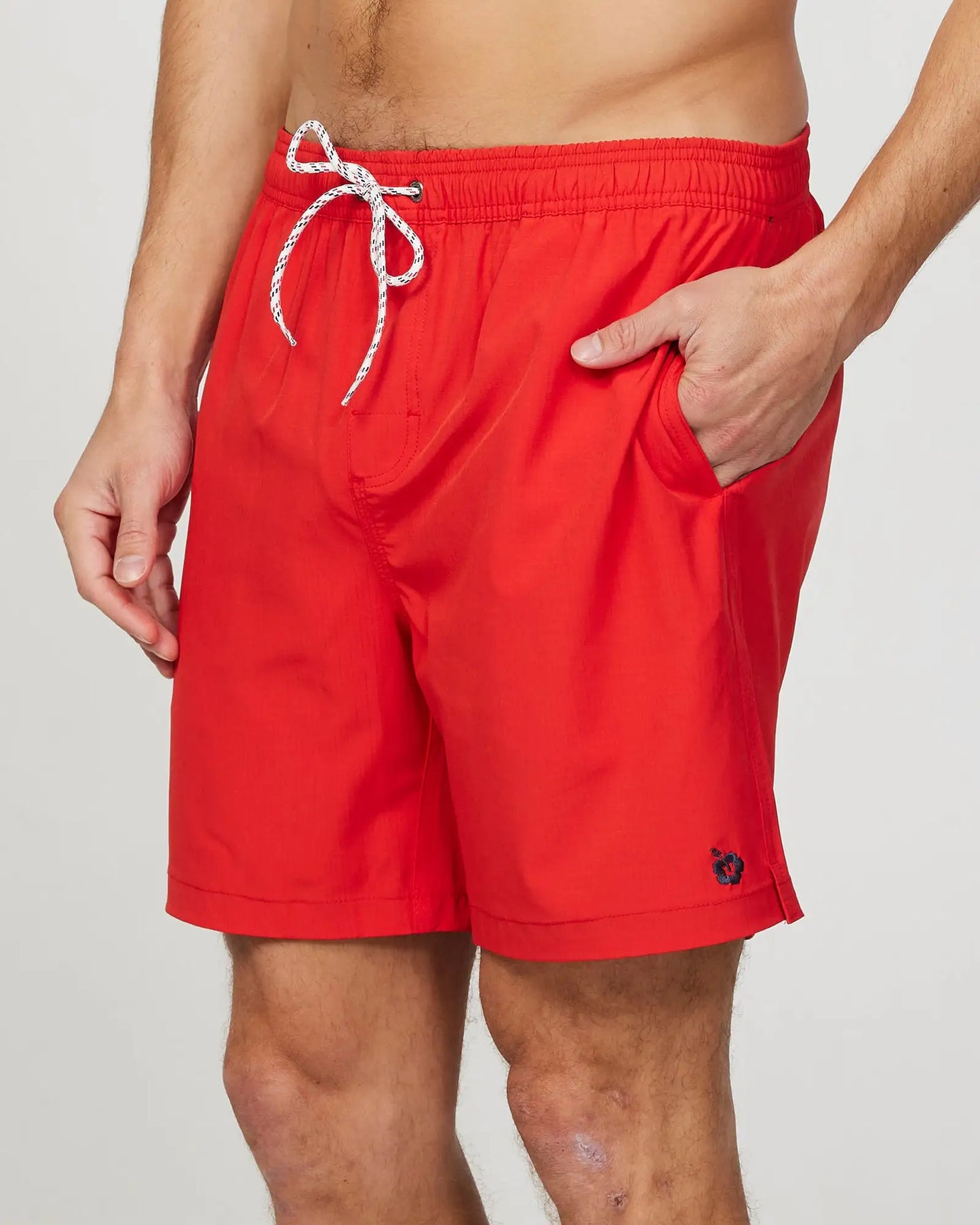 Left side view of the Okanui Mens Onboard stretch swim short in Red