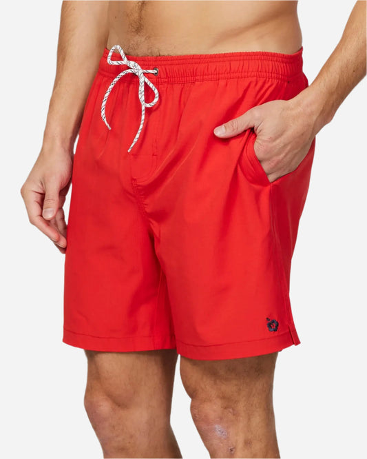 Left side view of the Okanui Mens Onboard stretch swim short in Red