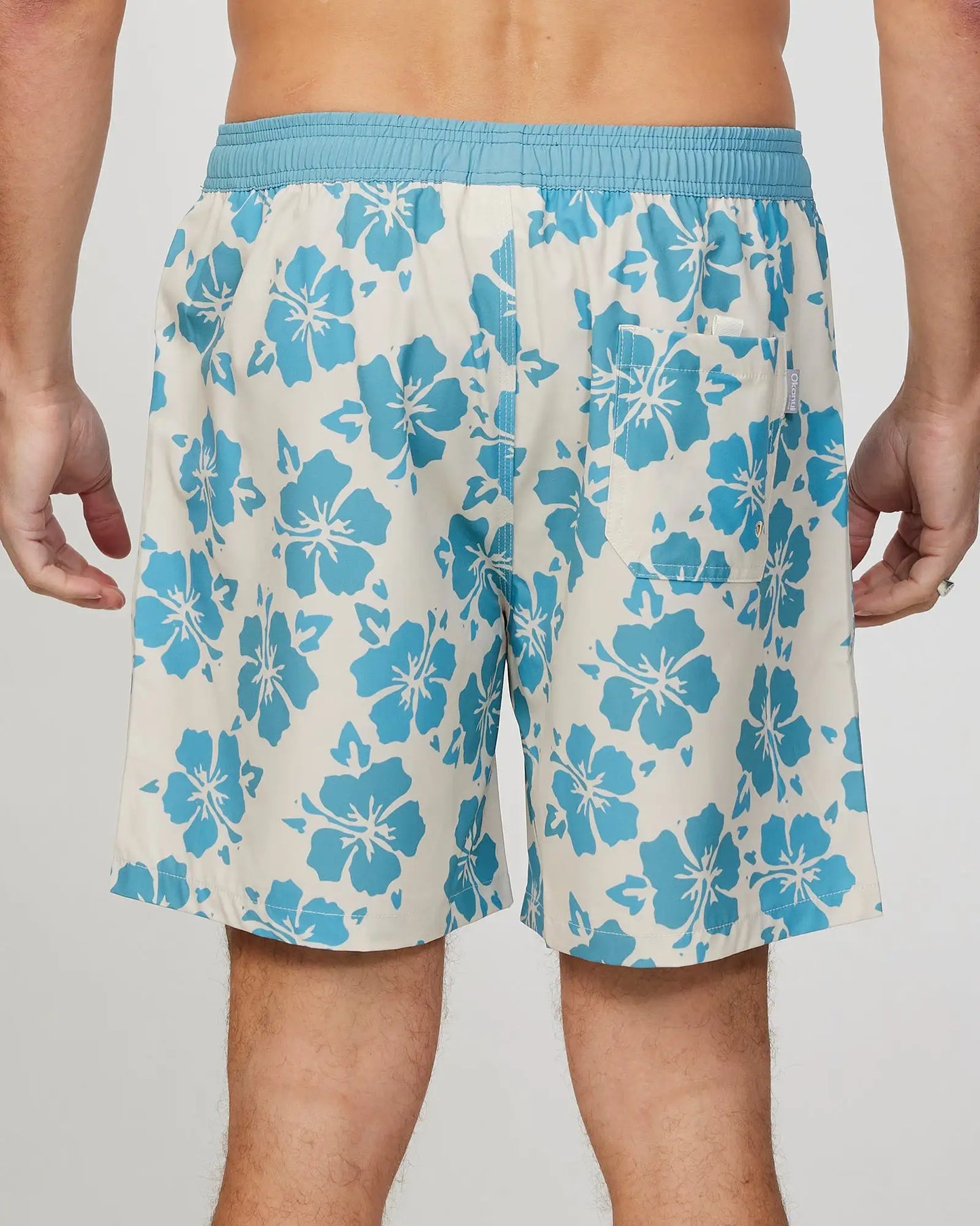 Back view of the Okanui Mens Waterworld stretch swim short in Stone Aqua