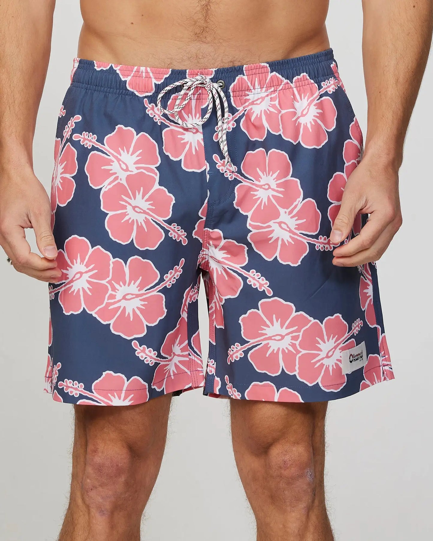 Front view of the Okanui Mens Stretch Swim Short in Iron Pink