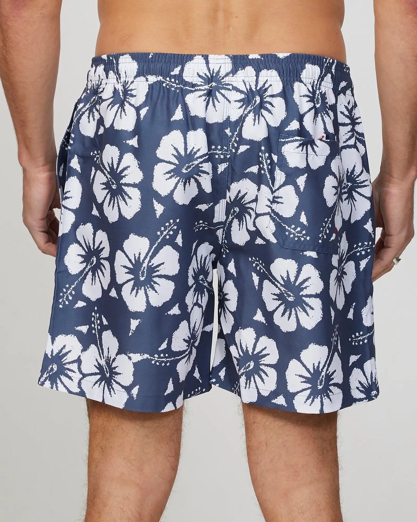 Back view of the Okanui mens classic swim short in hibiscus iron