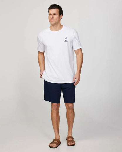 Full body front view of a male model wearing the Okanui Cruise Tee T-shirt in White