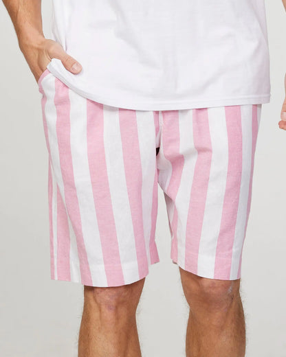 Front view of a male model wearing the Okanui Mens Classic Stripe Walk short in Pink