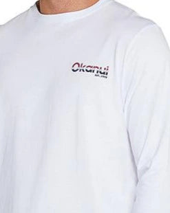 A close up view of the Okanui logo on the left chest of the Classic long sleeve t-shirt.