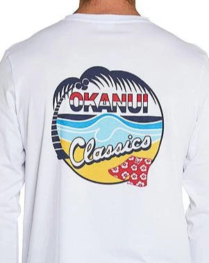 The closer look of the t-shirt print at the back featuring a cartoon of coconut tree, waves, sand, logo of Okanui and the word classics.