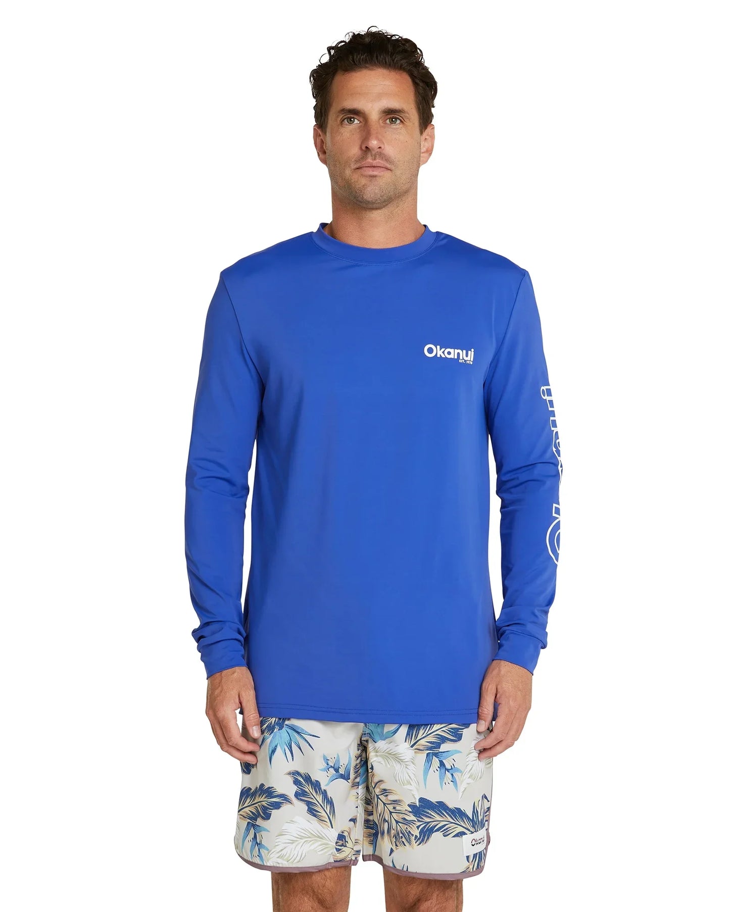 The Okanui Men's summer long sleeve rash shirt in royal blue.
