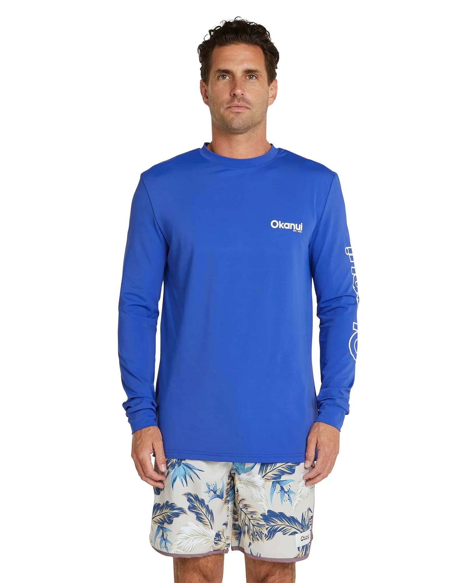 The Okanui Men's summer long sleeve rash shirt in royal blue.