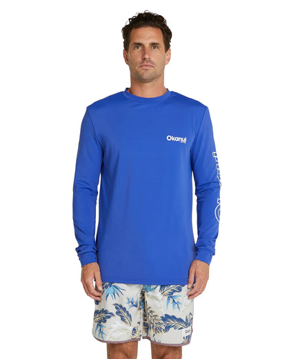 The Okanui Men's summer long sleeve rash shirt in royal blue.