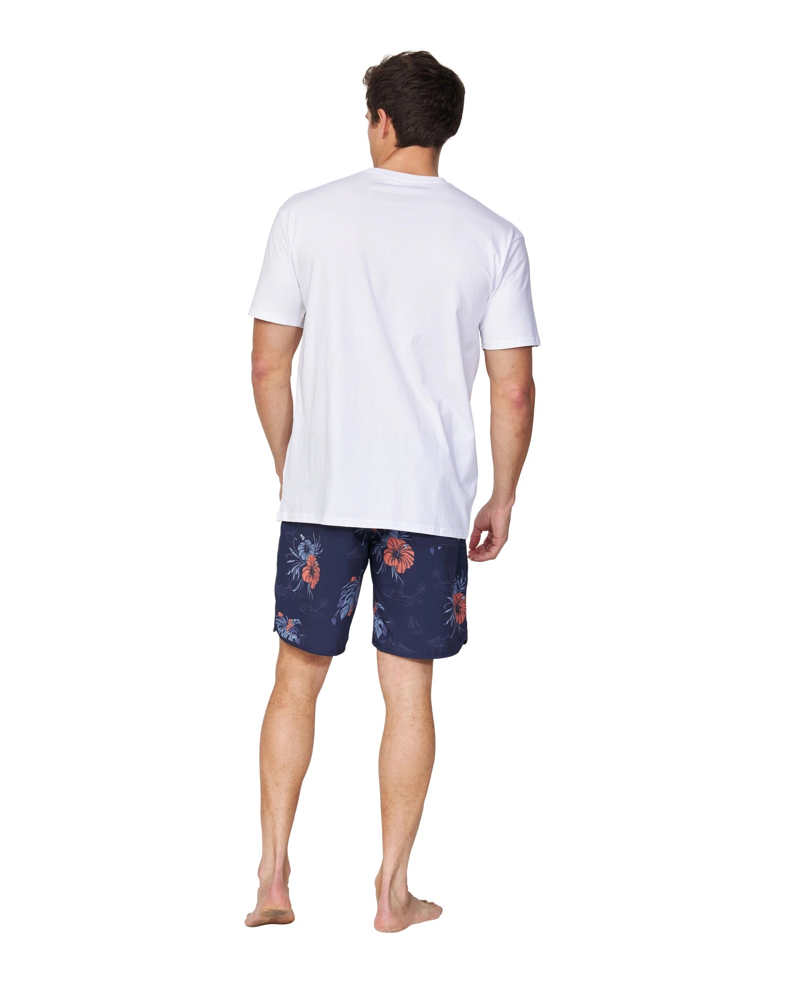 A full body back view of a male model wearing the Okanui Logo Tee in white.