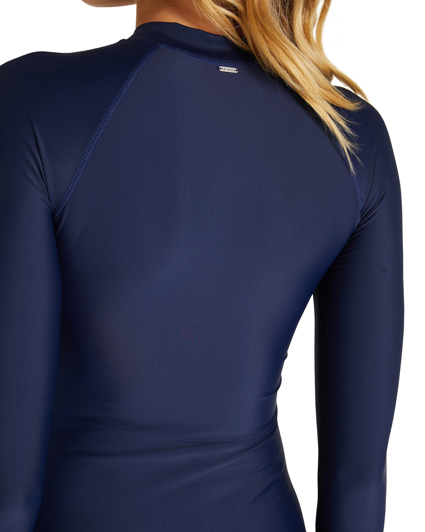 Close up view of the Okanui womens long sleeve rash vest in Navy