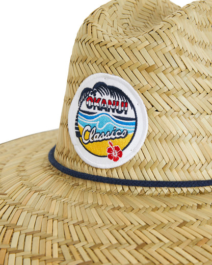 Close up view of the classic badge of Okanui wide brim straw hat