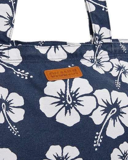 Close up view of the Okanui womens beach tote bag in hibiscus print