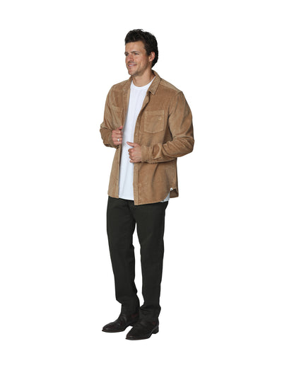 Left angled view of a male model wearing the Okanui Mens long sleeve corduroy jacket in sand