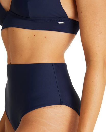 Close up view of the Okanui high cut waist bikini bottom swimsuit in Navy